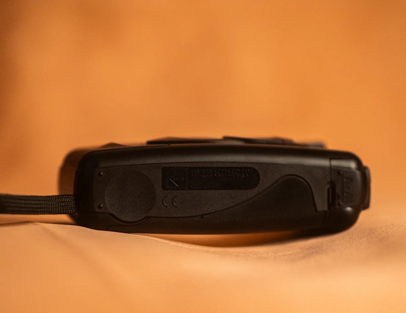 The base of the camera, showing the Eastman Kodak Company moulding, the CE mark and the battery door.